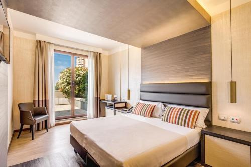 Zona XXIV Fonte Ostiense Hotel | Warmthotel