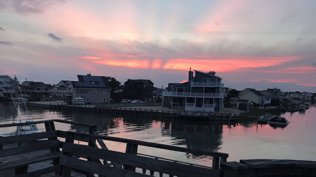 Osborn Island House | Watersports paradise, 65ft floating dock, bay in front, lagoon in back yard