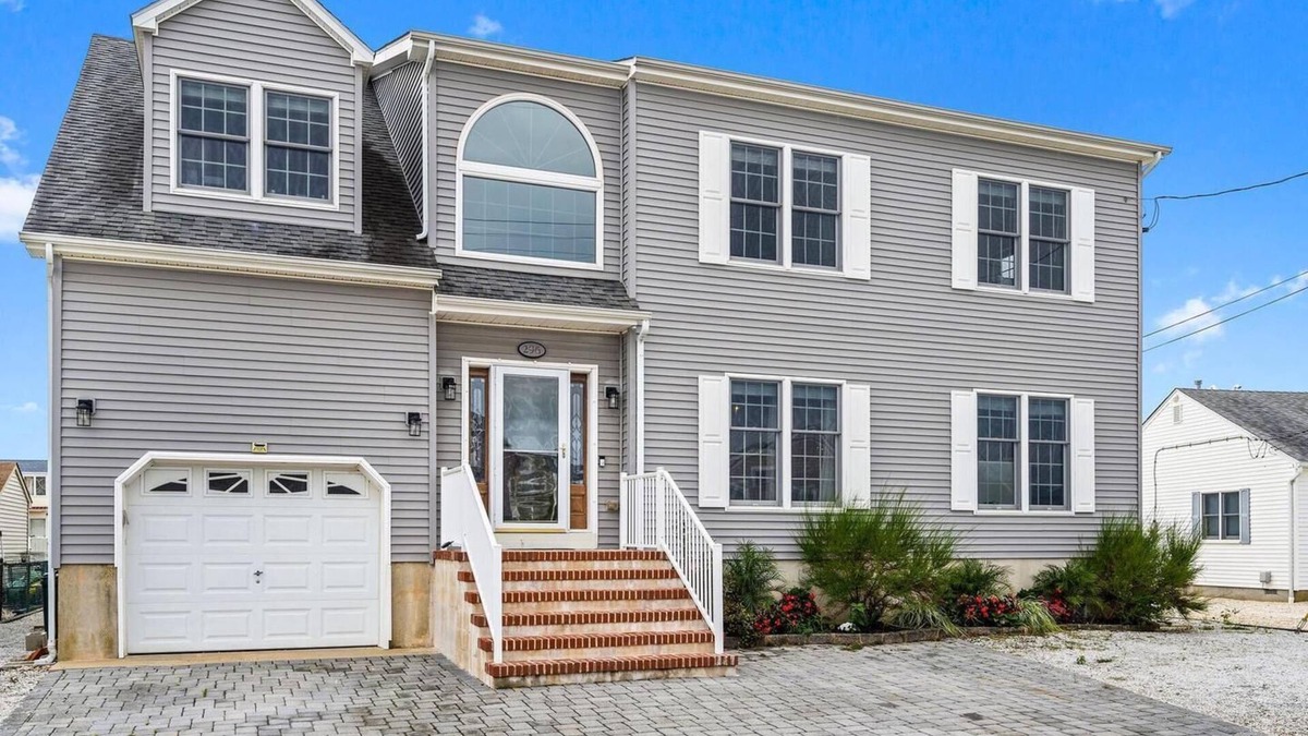Beach Haven West House | Water Front Lagoon Home - Private Dock w/Kayaks & Paddleboards