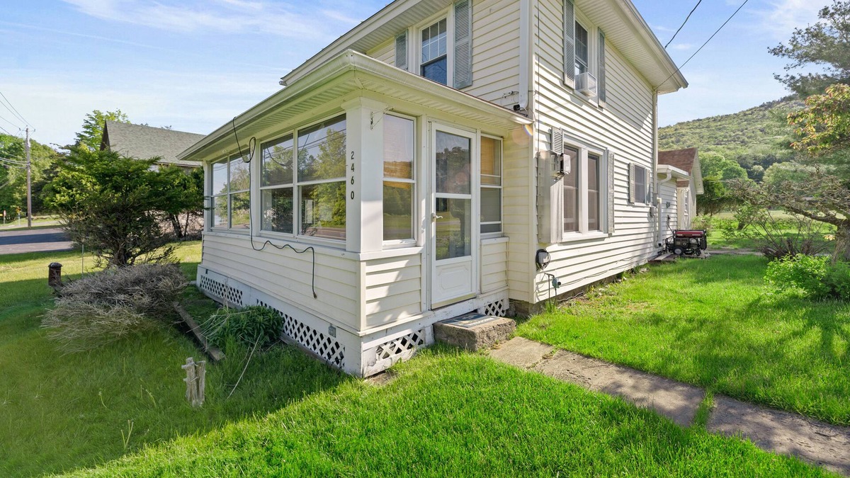 Lake George House | Water view home with a wood stove, grill, & partial air-conditioning - dogs ok
