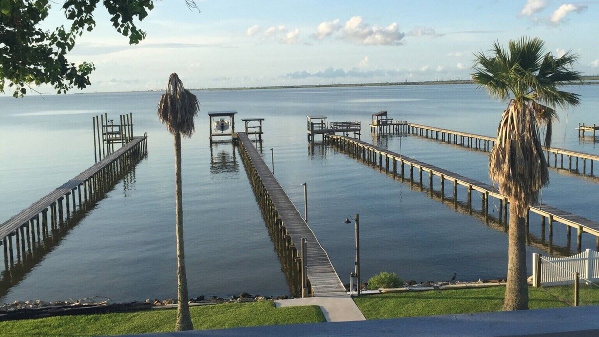 Dickinson House | Waterfront Bay House with Elevator, 350' Lighted Fishing Pier with Boat Lift.