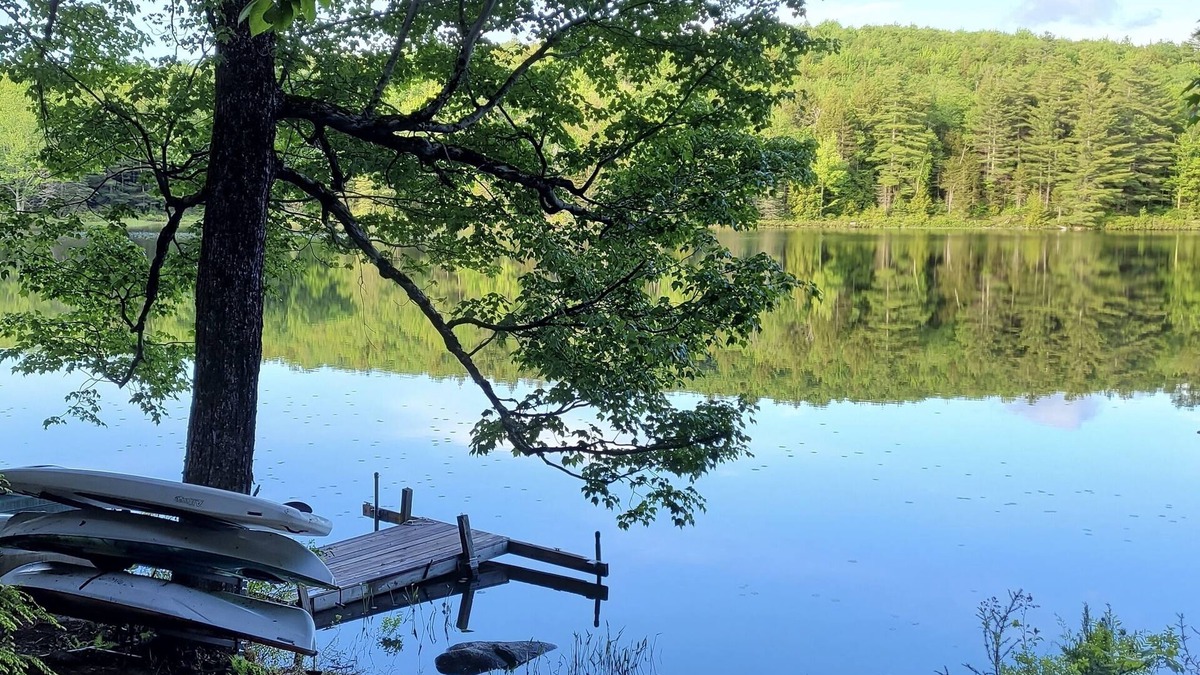 Grantham Cabin | Waterfront Cabin- look down on water from deck, private docks & fire pit