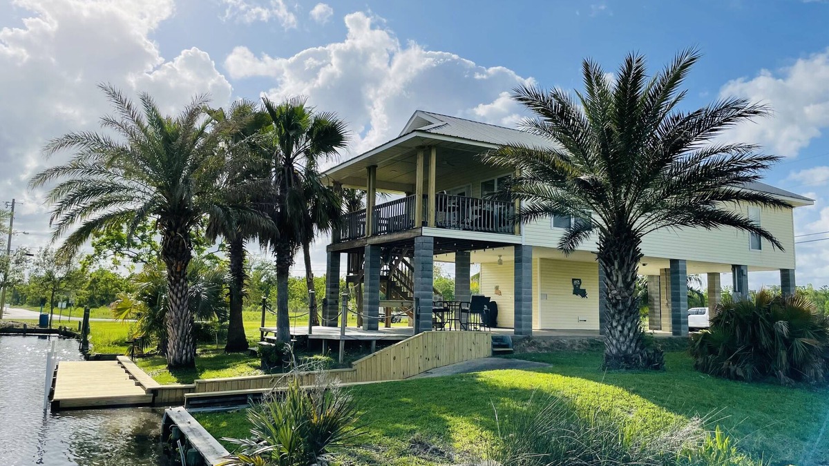 Shoreline Park House | Waterfront Camp in Jourdan River Estates