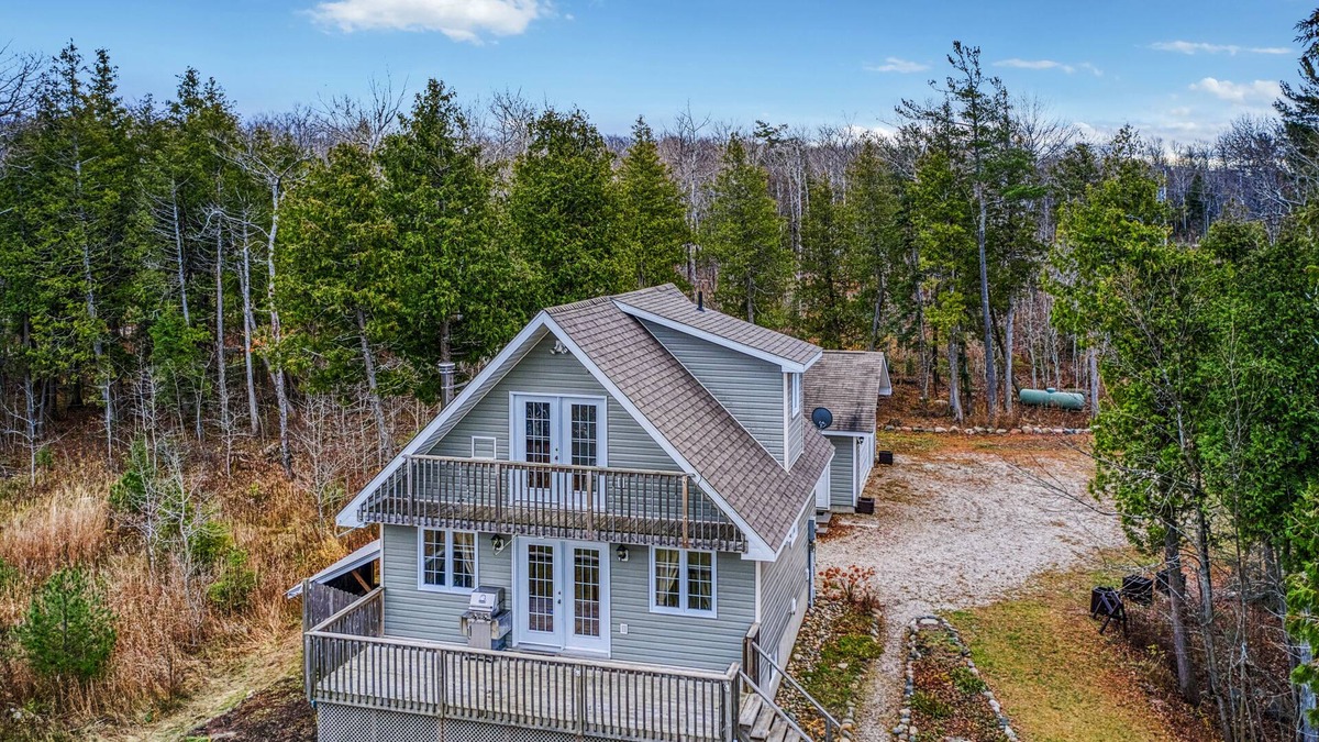 Manitoulin District House | Waterfront, chalet style home; minutes walk to the beach