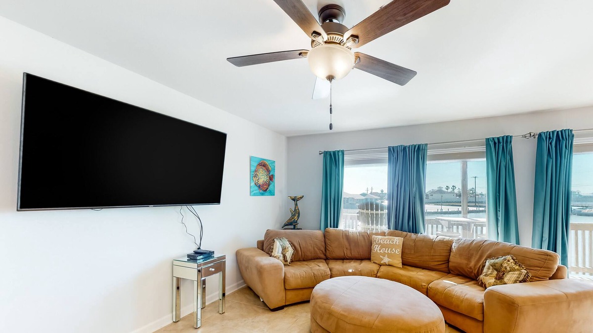 Harbor Oaks House | Waterfront condo with balcony, private boat slip, fishing pier, pools, & tennis
