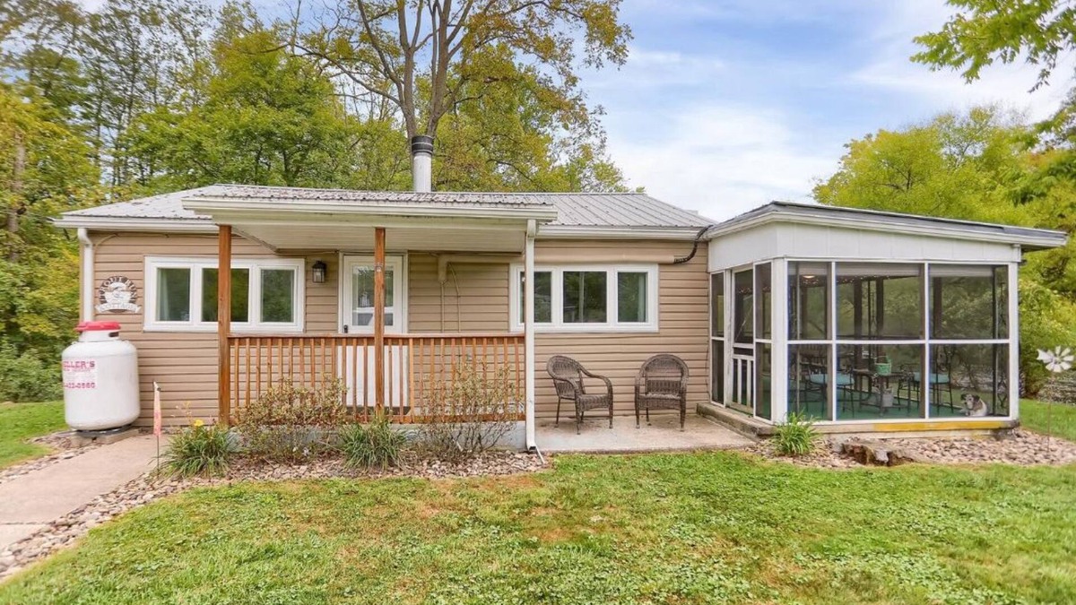 Swengel Cabin | Waterfront cottage with hot tub, & fire pit. Pet friendly.