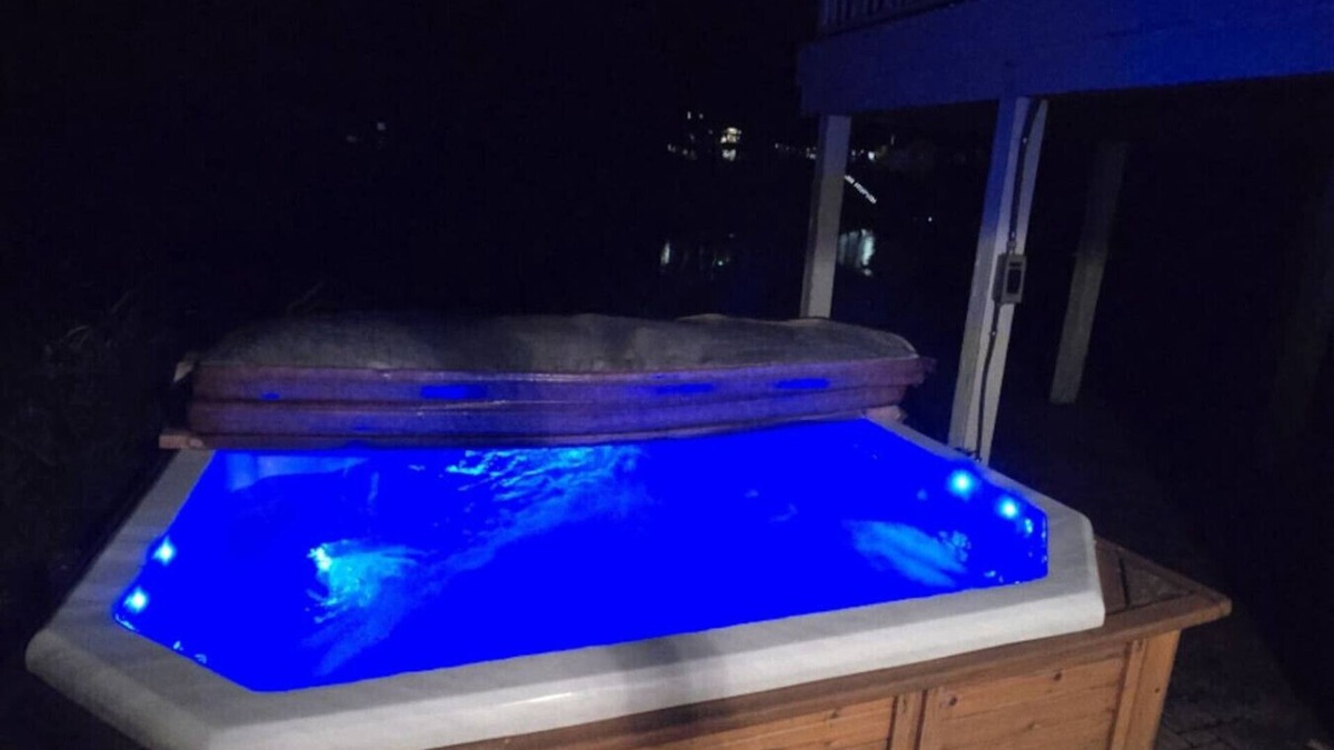 Spring Lake House | Waterfront home Spring Lake hot tub, firepit, gas grill fishing