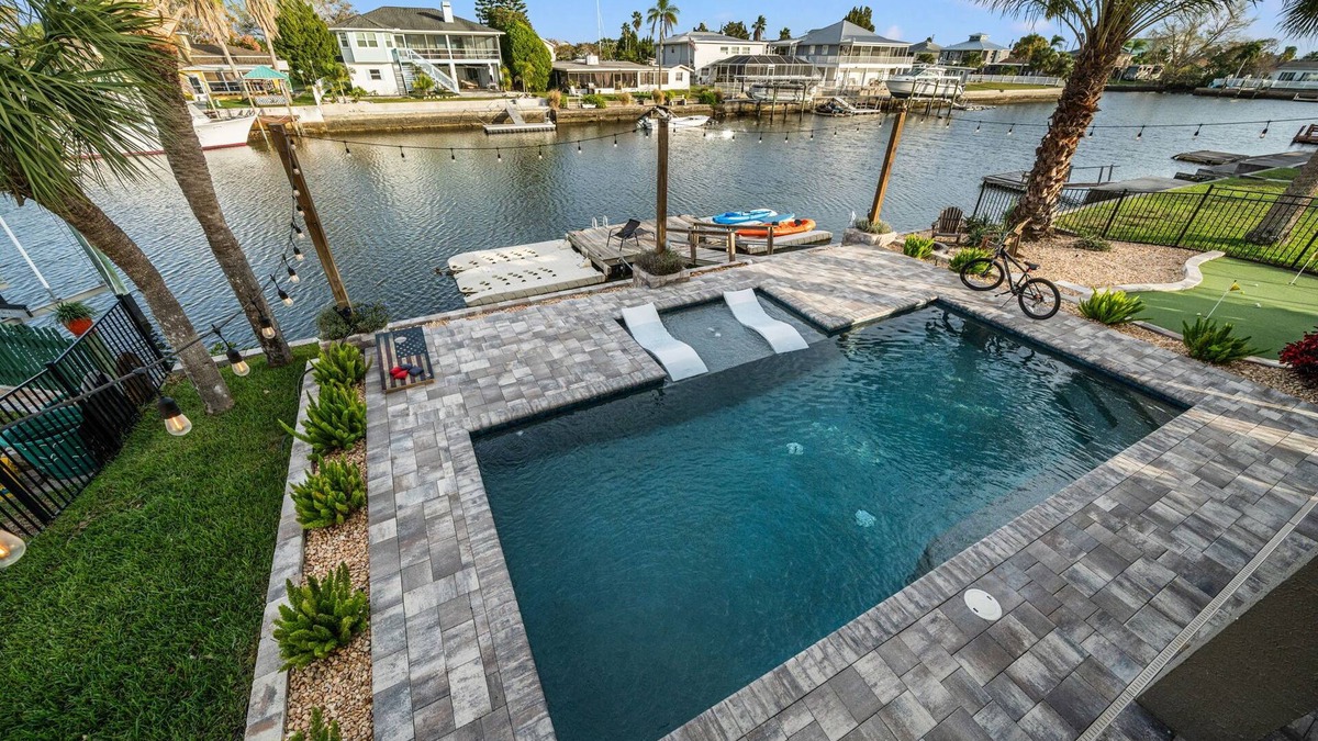 Spring Hill House | Waterfront home w/direct gulf access + pool + hot tub + activites!
