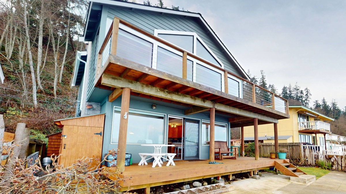 Langley House | Waterfront home with views, deck and open concept living