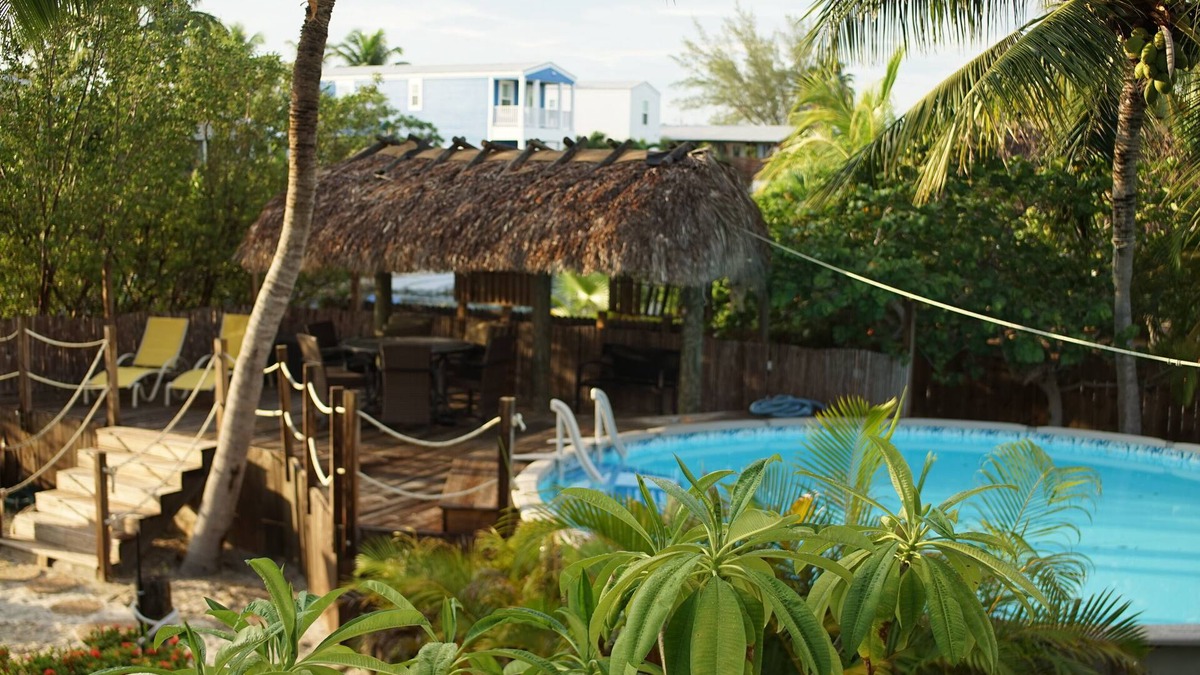 Bay Point House | Waterfront Pool Oasis: Tiki Hut, Kayaks & Family Fun!