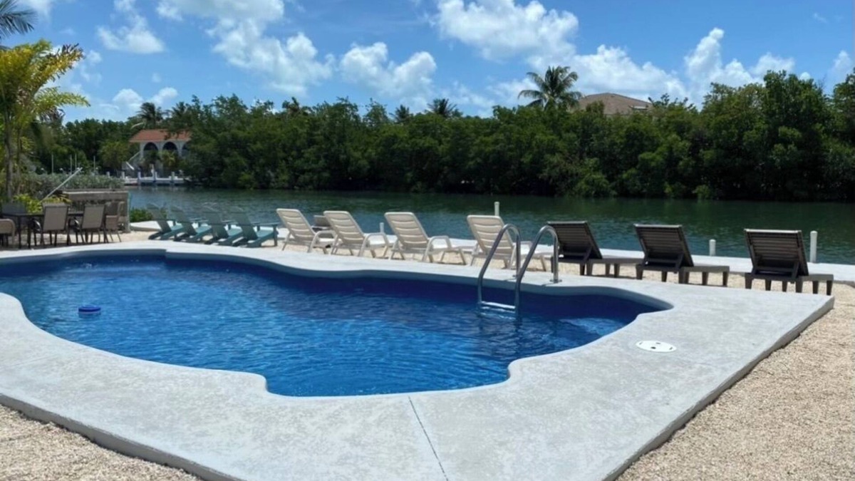 Marathon House | Waterfront Private Home-7 BR, 6 Full BA, Pool, 80' Dock, Parking, Screened Porch