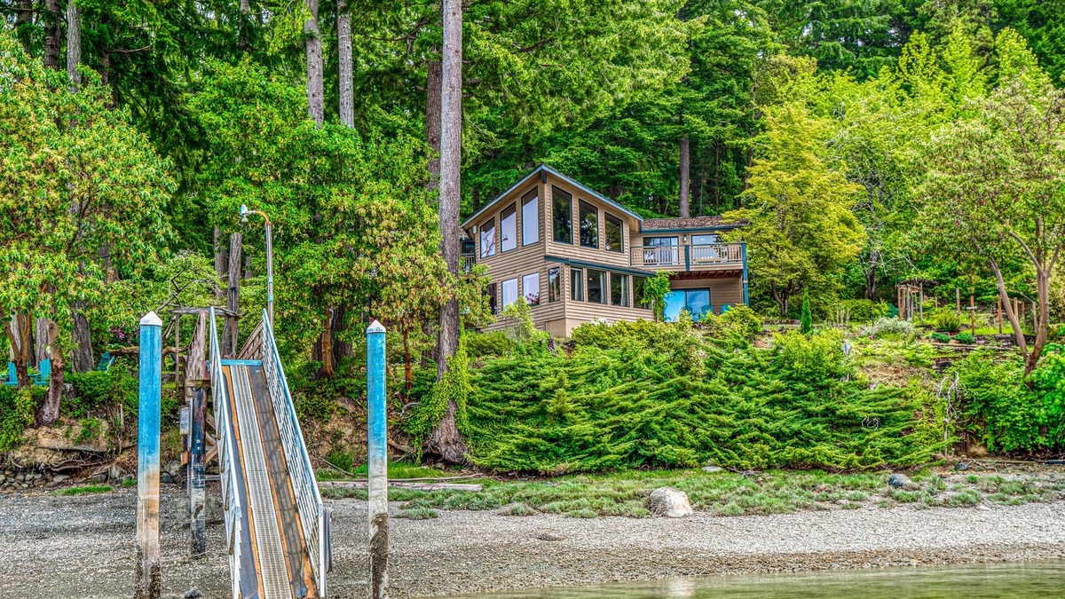 Olympia House | Waterfront retreat on 1.4 forested acres with amazing views & private dock