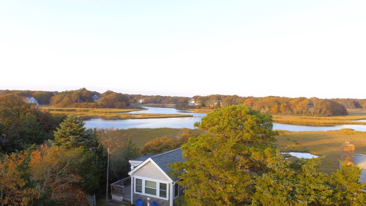 Centerville Cottage | Waterfront! Riverfront delight. 2 BR, private, decks. Steps to Craigville Beach