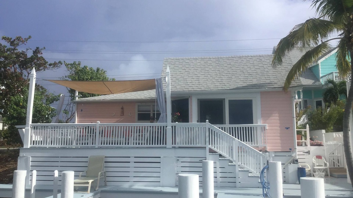 Lubbers Quarters Cay Villa | WATERFRONT VILLA with deck to enjoy the scenic views & historical lighthouse.