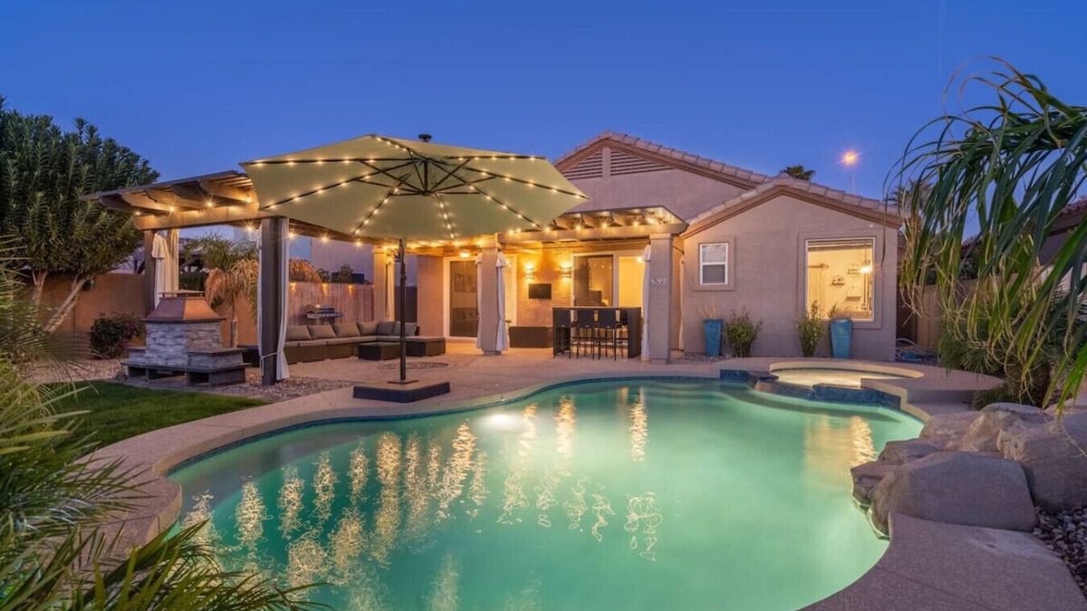 Fox Crossing Villa | Waterfront Villa with Pool Hot Tub Lounge area