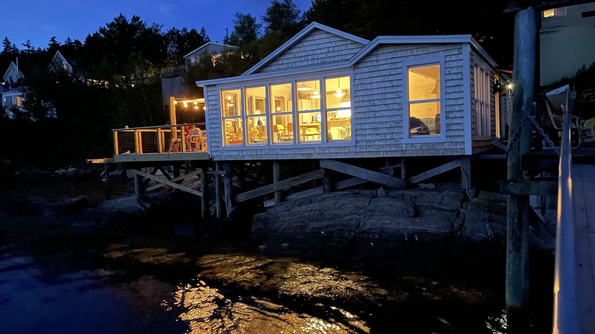 Georgetown Cottage | Waterfront, west facing, modernized fisherman’s cottage perched on the water.