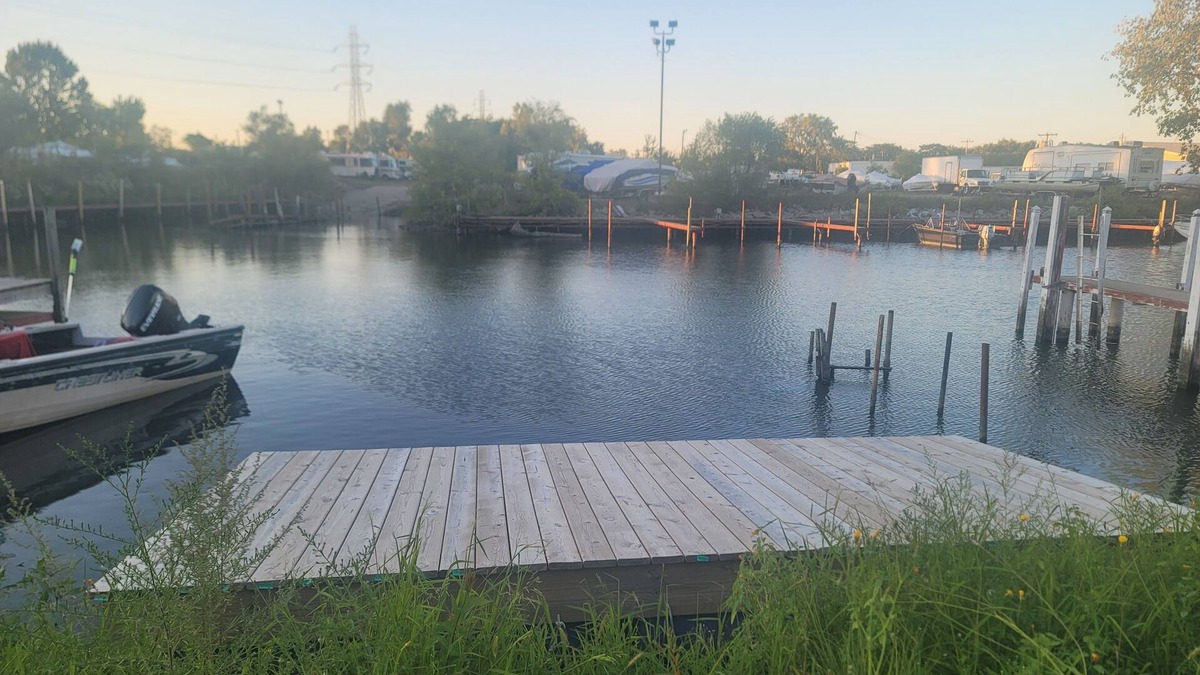 Wyandotte House | Waterfront with boat dock 3-bedroom house on Detroit River canal. Good for 8