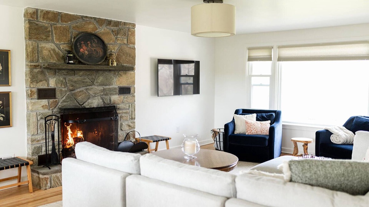Fertility Cottage | Waterfront with Wood Fireplace + Outdoor Firepit + Paddleboat +1 mile to outlets