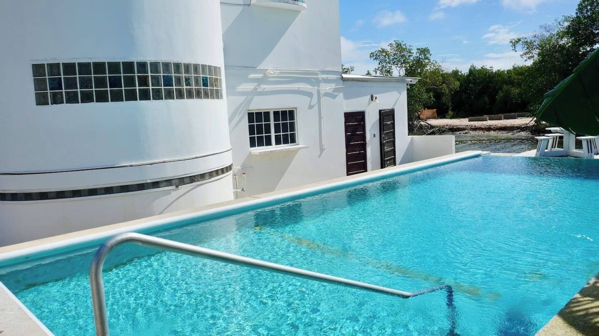 Belize City Apartment | Waterside Sea View 2-BR Apt for 6 w Balcony & Pool