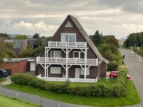 Friedrichskoog-Spitze Apartment | Wattnest - Ferienwohnung direkt in erster Meereslinie am Deich