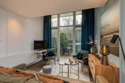 Groot Valkenisse House | Welcome in - WoesteHoeve Sfeervol Vakantiehuisje in Zeeland aan Zee, Dicht bij Strand & Natuur