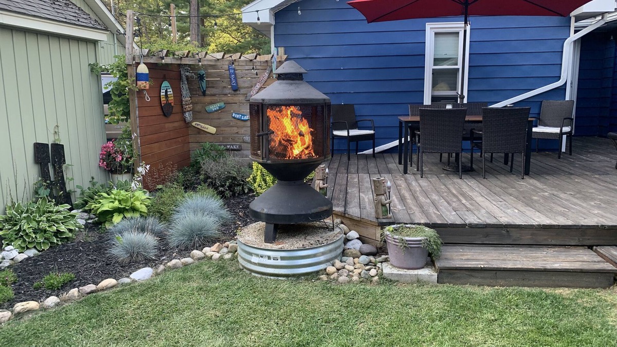 Indian River House | Welcome to Maison Bleu…just 200 steps away from the waters edge of Burt Lake!