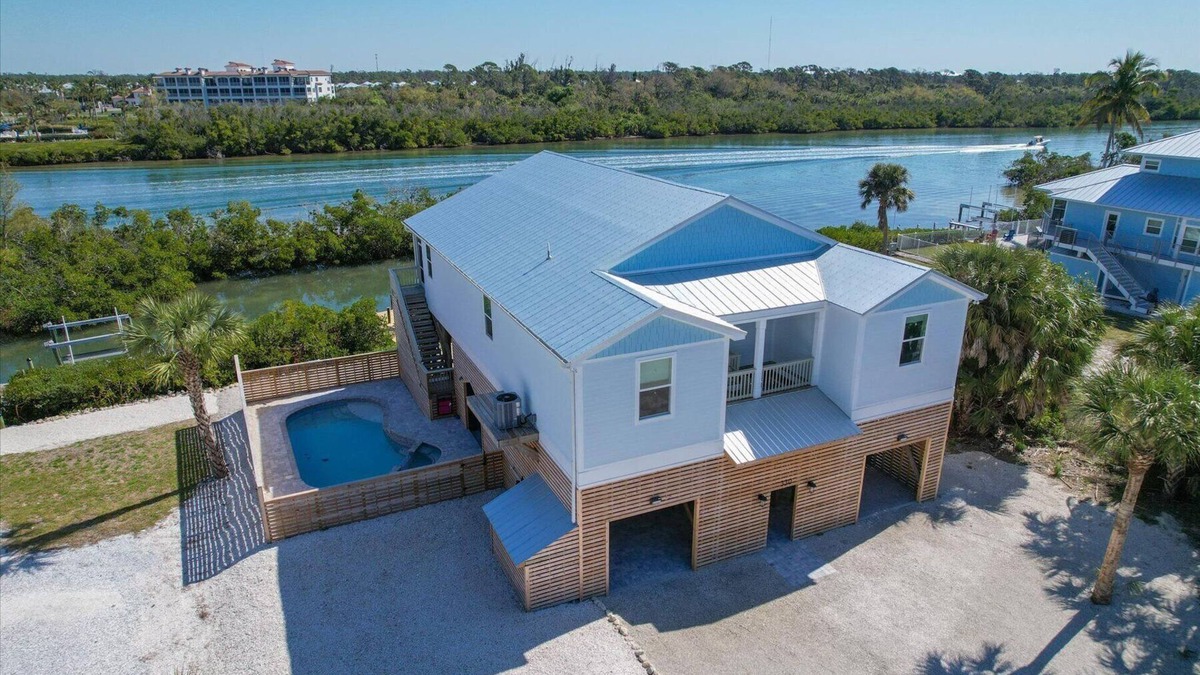 Palm Island House | Welcome to the Tipsy Turtle: Luxury 4 bedroom home with Pool and Private Dock on Palm Island