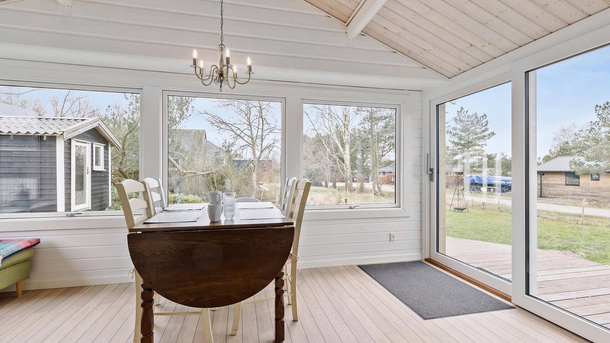 Skibby House | Welcome to this cozy wooden holiday home for a wonderful vacation.