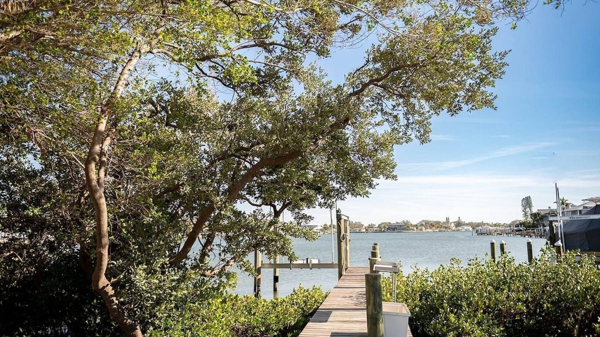 Belleair Shore House | Welcome to your private coastal getaway! This fully renovated 3-bedroom, 2-bath single family home is perfectly located on the Intracoastal Waterway—just a 2-minute walk to the sugar-white sands of Indian