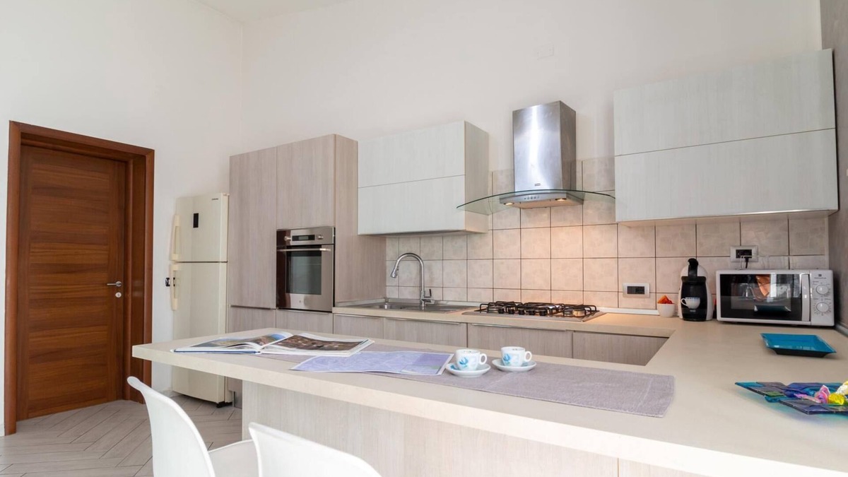 Nurachi Apartment | Welcomely - Mameli Apartment