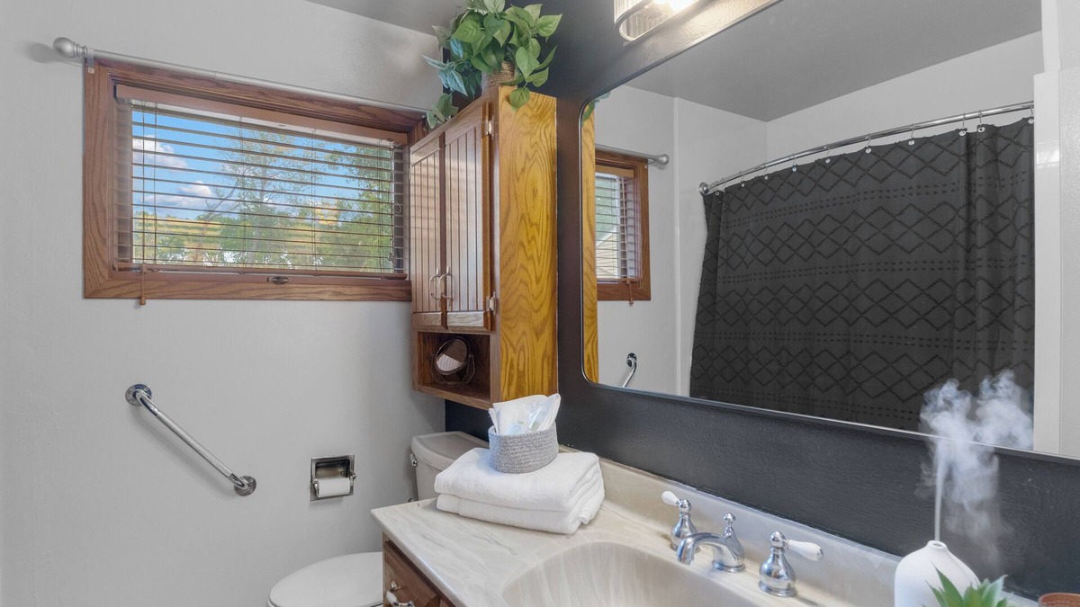 Waterloo House | Welcoming 2-bedroom home with large deck and central location.
