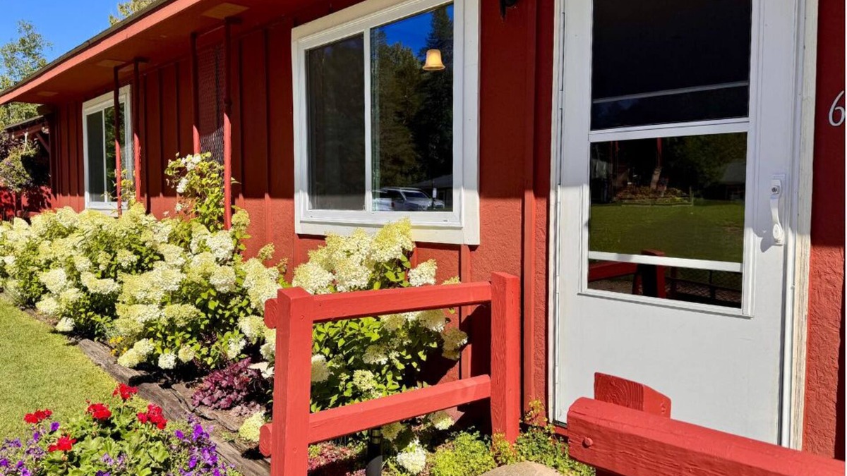 Trout Lake Hotel | Welcoming King Room #6 with AC at lakefront Twin Cedars Resort in Trout Lake MI