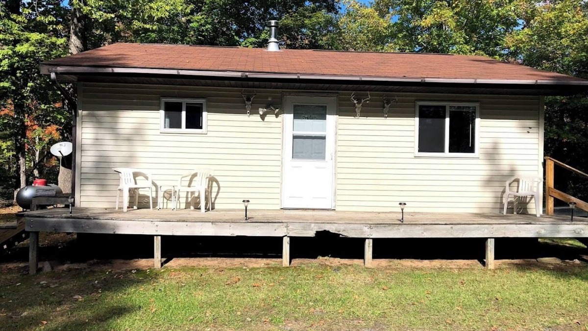 Skanee House | Welcoming off the Grid 2-bedroom Cabin in Skanee. On the Big Huron River.