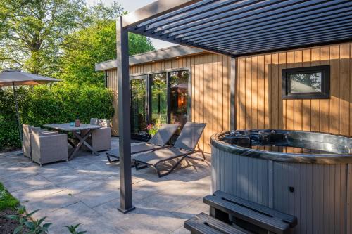 Stieltjeskanaal Apartment | Wellnesslodge Scholekster met jacuzzi en uitzicht