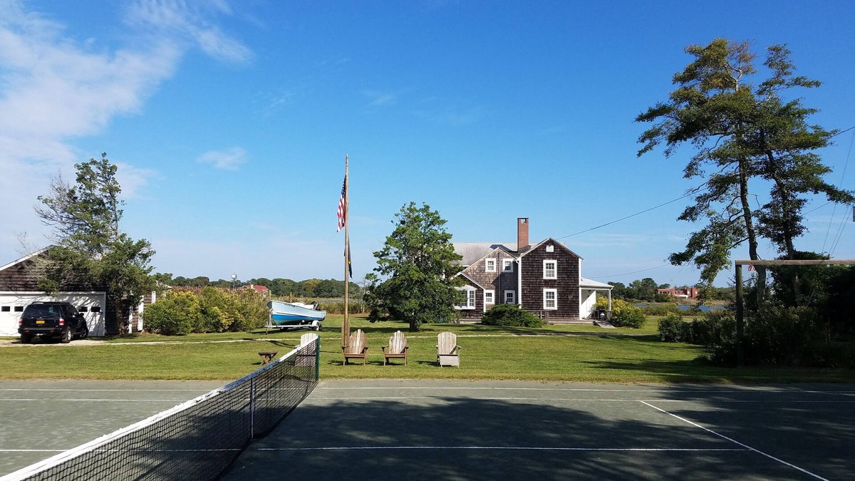 Quioque House | Westhampton quintessential waterfront 2 acres w/tennis, dock.