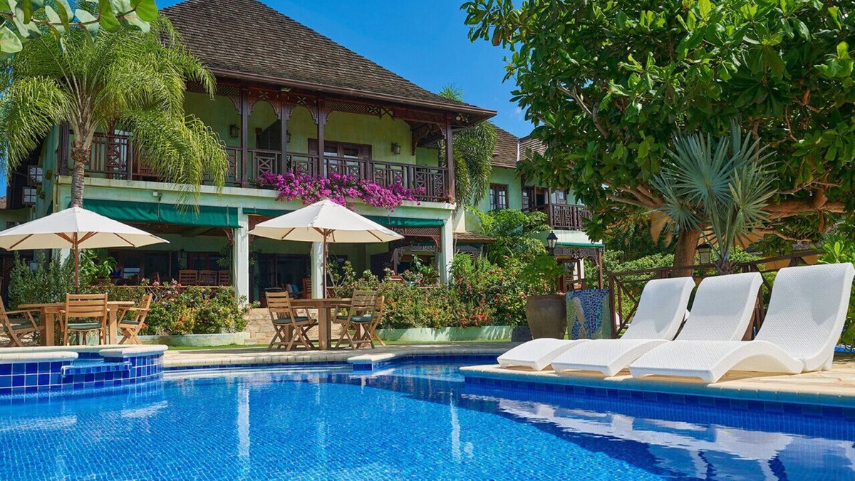 Discovery Bay Villa | Whispering Waters Villa- Exclusive Beachfront Retreat. Pool, & Spacious Terraces