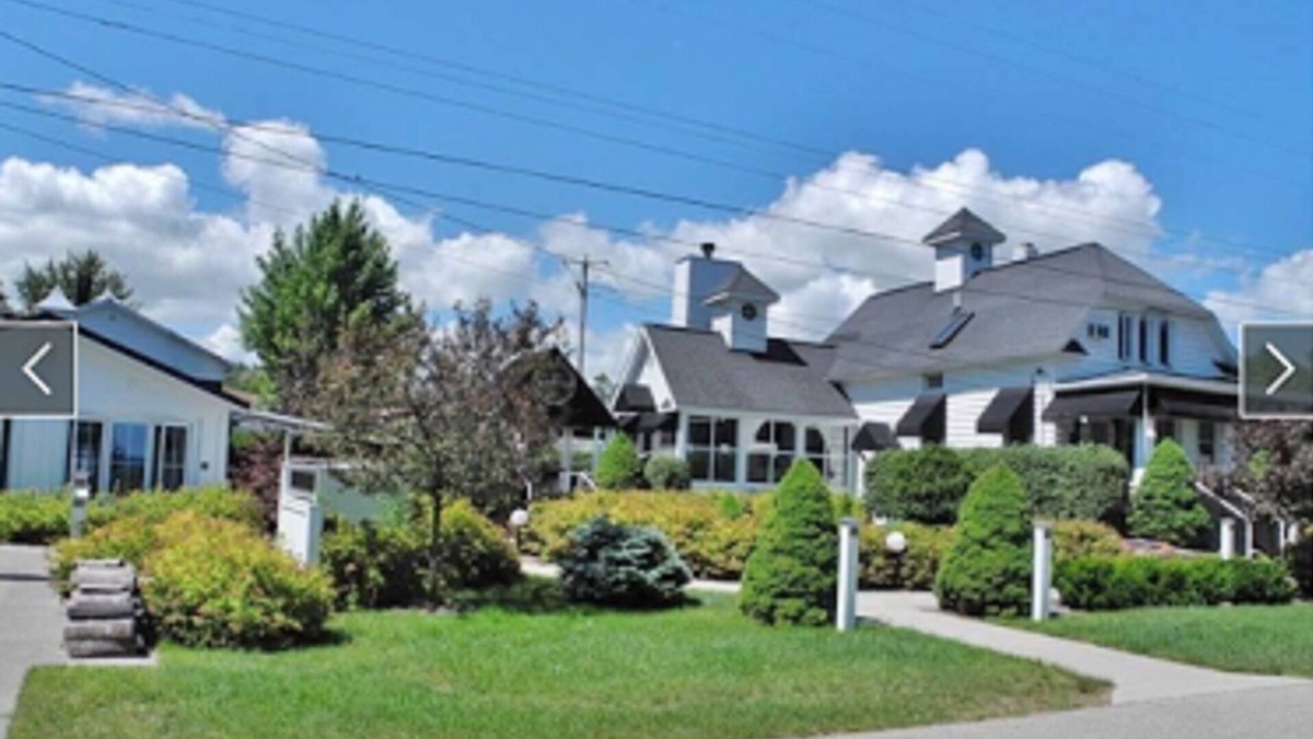 Suttons Bay House | White Fence-Exquisite Private Waterfront!
