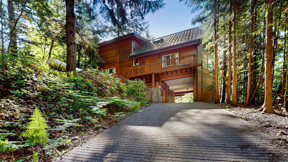 Sudden Valley House | Wilderness retreat on a double lot with a fireplace, large deck, & W/D