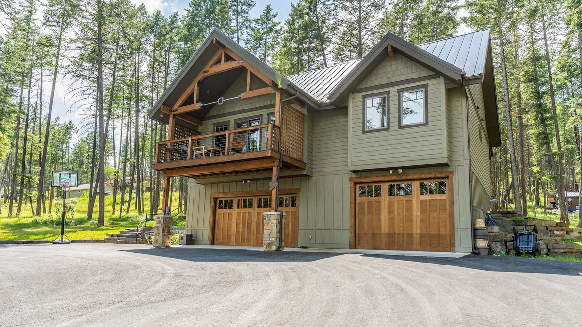 Lakeside House | Wilderness retreat with a large deck, grill, updated interior, fireplace, and AC