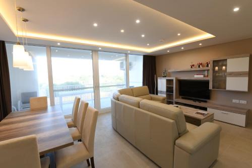 Qala Apartment | Wileg 4B Luxury Two Bedroom Apartment with Shared Swimming Pool.