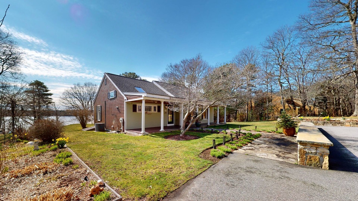 Cotuit House | Wonderful waterfront getaway with furnished deck, pond access, kayaks & WiFi