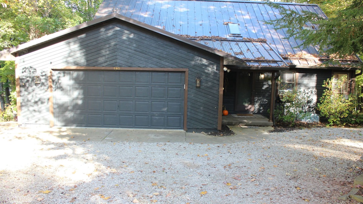 Howard House | Wooded, Lakefront home in Apple Valley