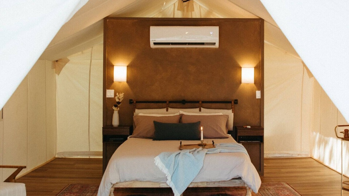 Prairie Lea RV Rental | Wooded retreat space with glamping tents, container homes & tons of amenities!