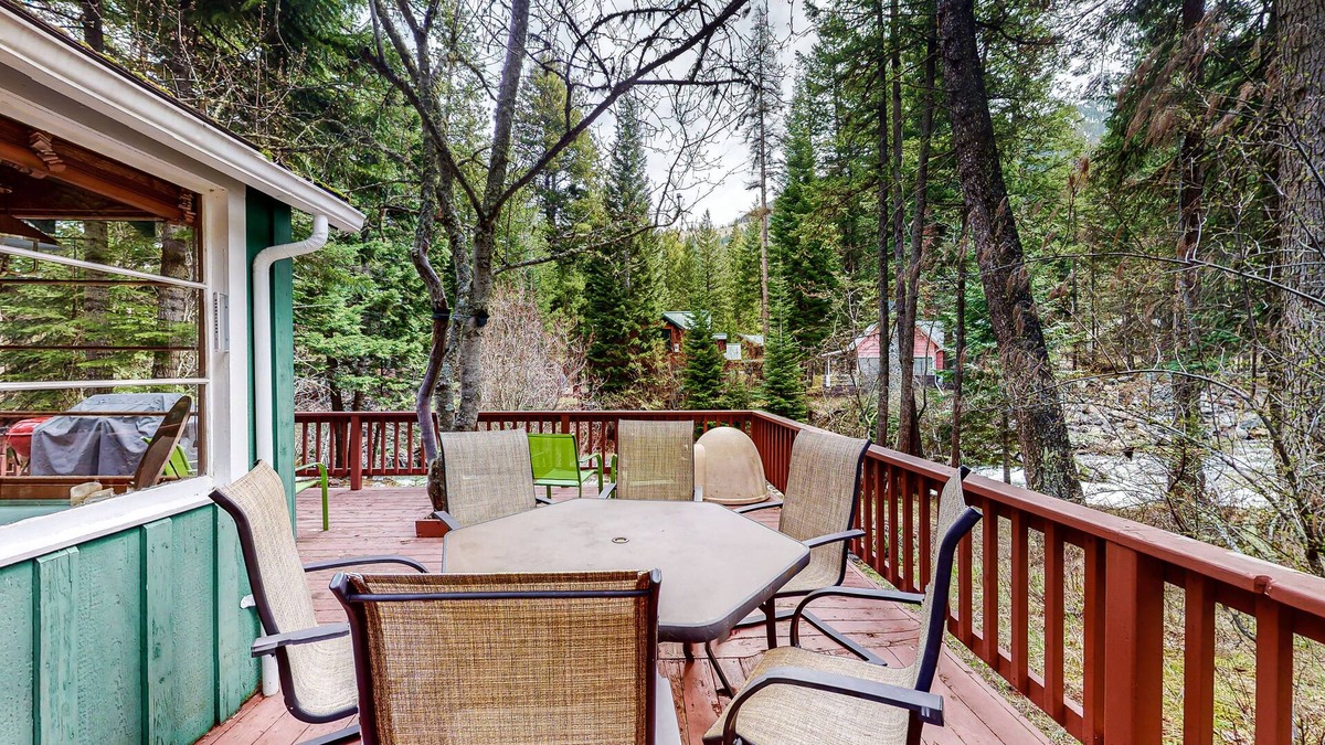 Wallowa County Cabin | Woodsy riverfront basecamp with fireplace, large deck & firepit - dogs welcome