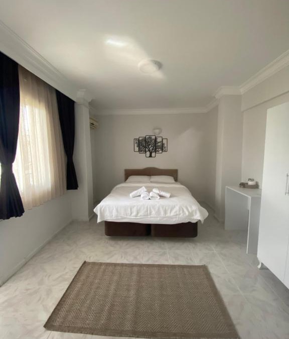 Cumhuriyet Bed & Breakfast | YALI OTEL SEFERİHİSAR ÜRKMEZ