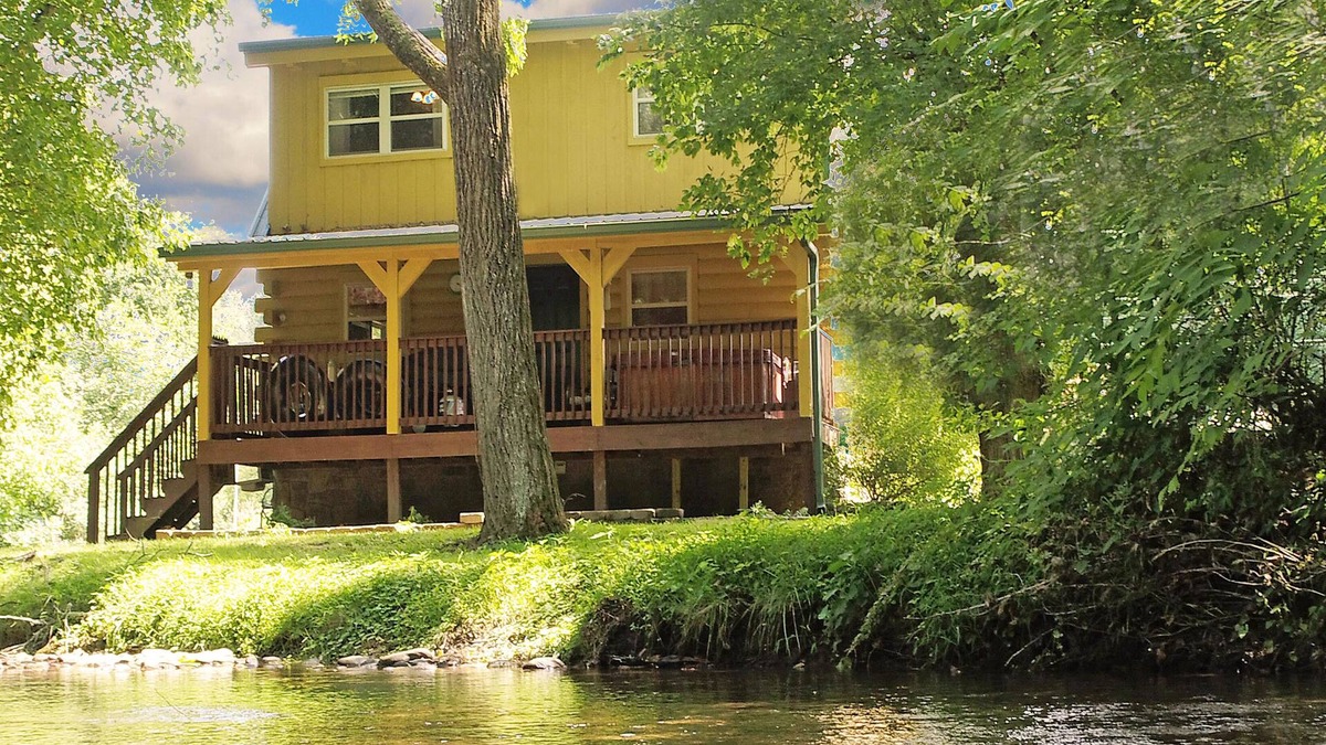 Newport Cabin | Yellow Cabin on the River by RedAwning