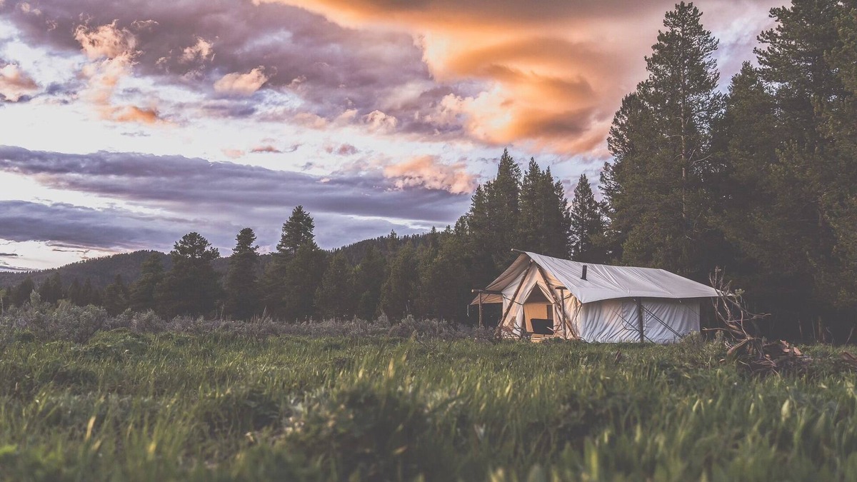 Island Park RV Rental | Yellowstone canvas tent w/ king bed & sleeper sofa