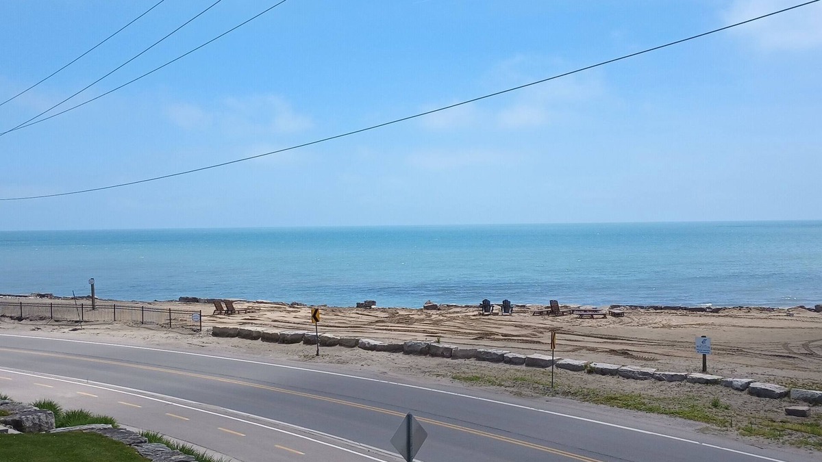 Long Point Condo | Yes that's the Lake view ! Private beach - Rooftop patio - Large balcony