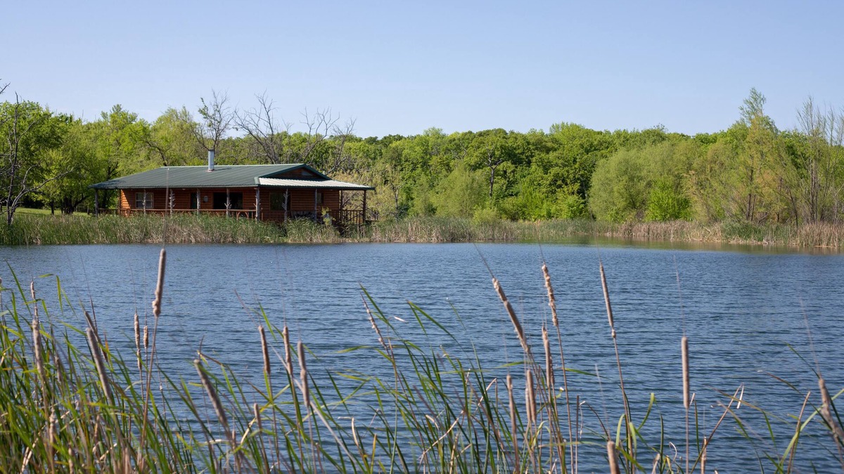 Fittstown Cabin | Your own private lakefront log cabin on a 1155 acre ranch.