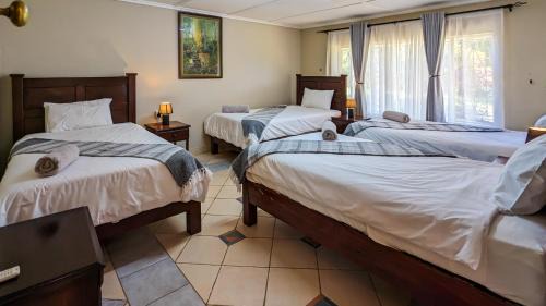 Victoria Falls House | Zambezi Family Lodge - Leopard Room
